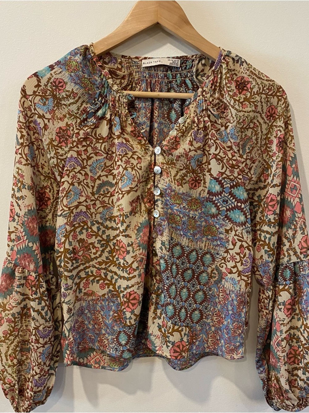 Black Tape_ long sleeve patterned top